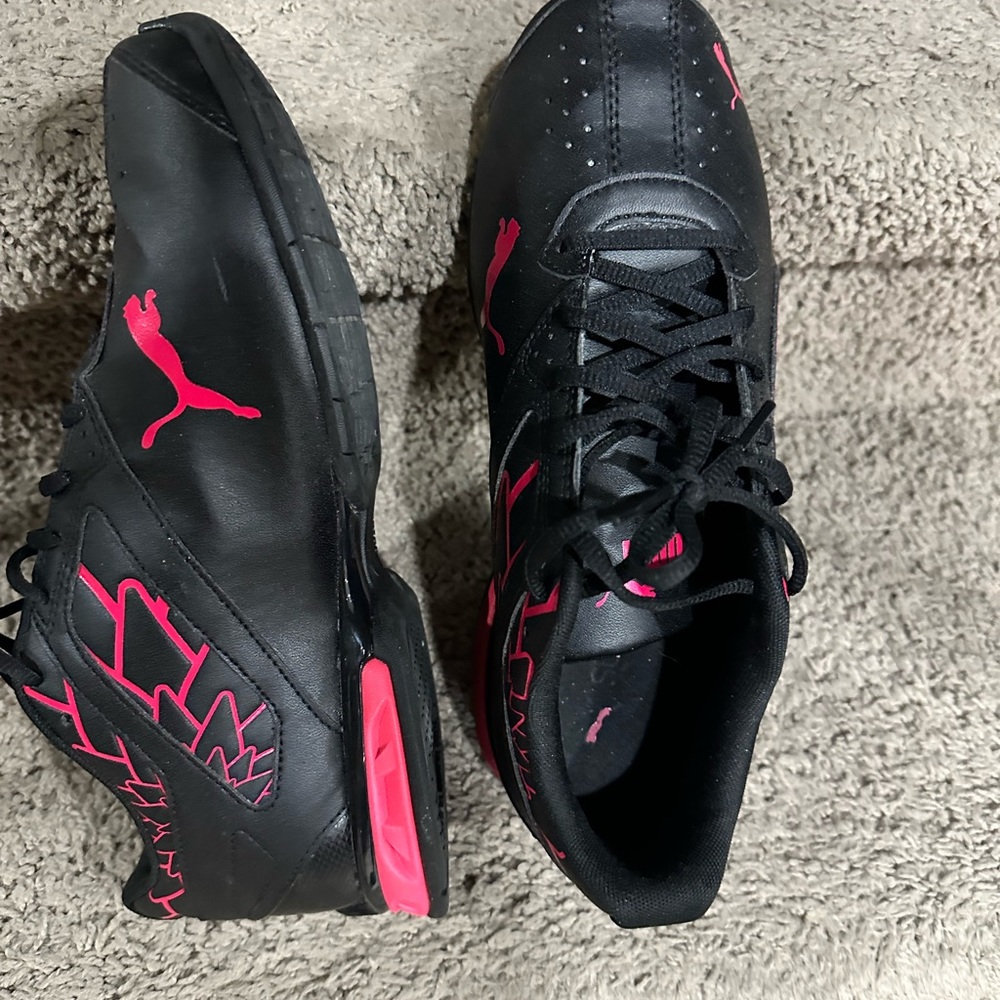 Puma sneakers size 11 women . Pink and black.
